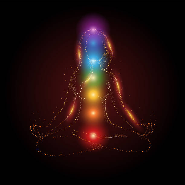 Particles of female figure meditating in lotus position with colorful 7 chakras and aura glow, vector illustration